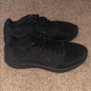 Black nike running shoes
